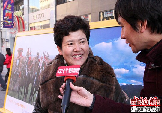 “新疆缩影 生态哈密”旅游图片展亮相王府井